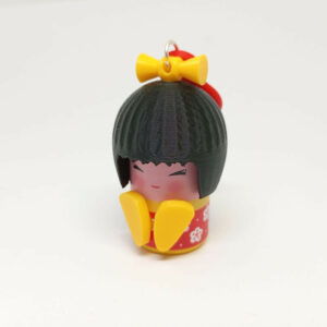 Kokeshi rojo amarillo